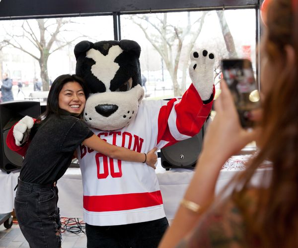 student hugging Rhett at Giving Day